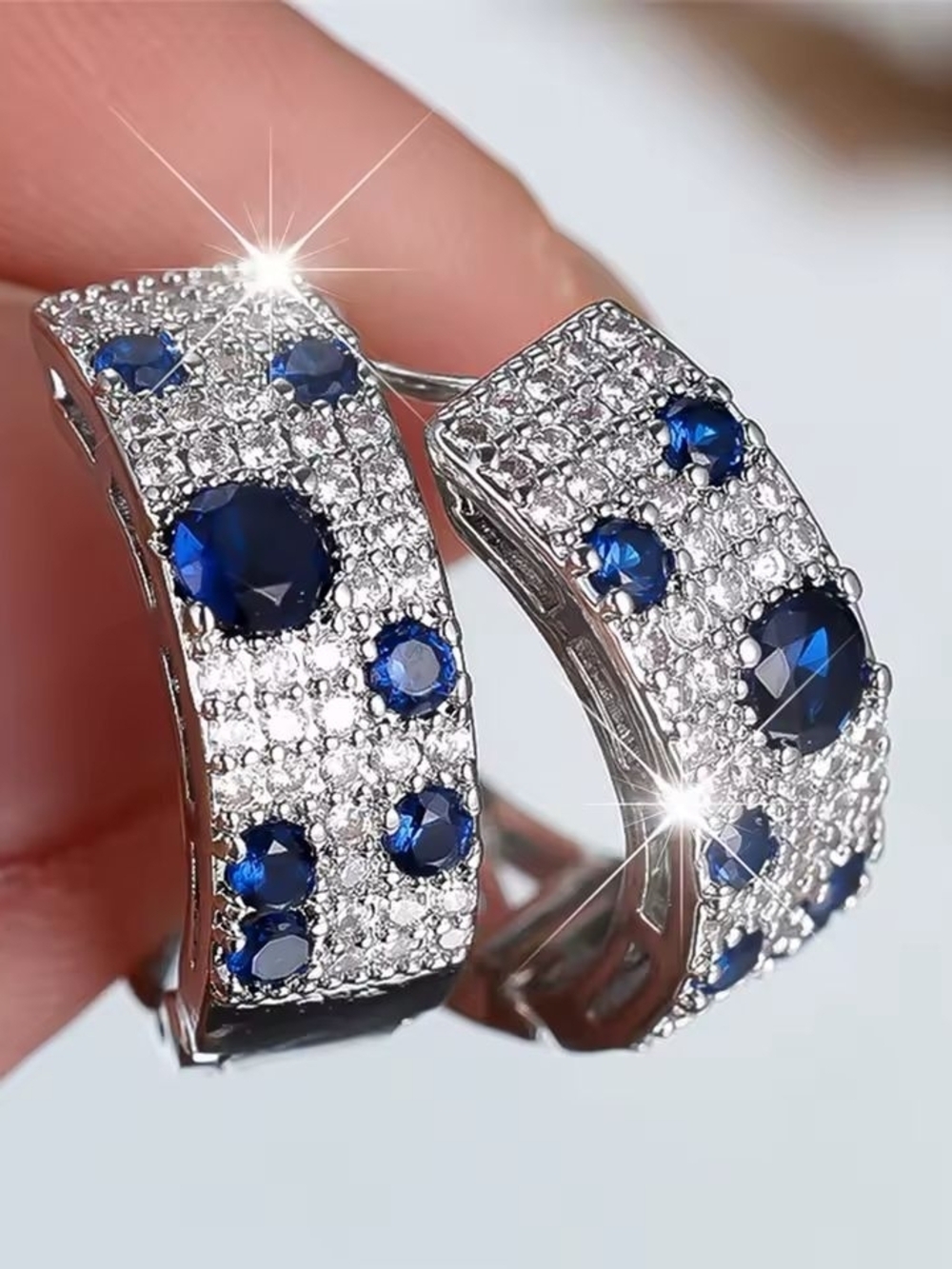 Sterling-Inspired Silver Hoop Earrings with Deep Blue Crystals